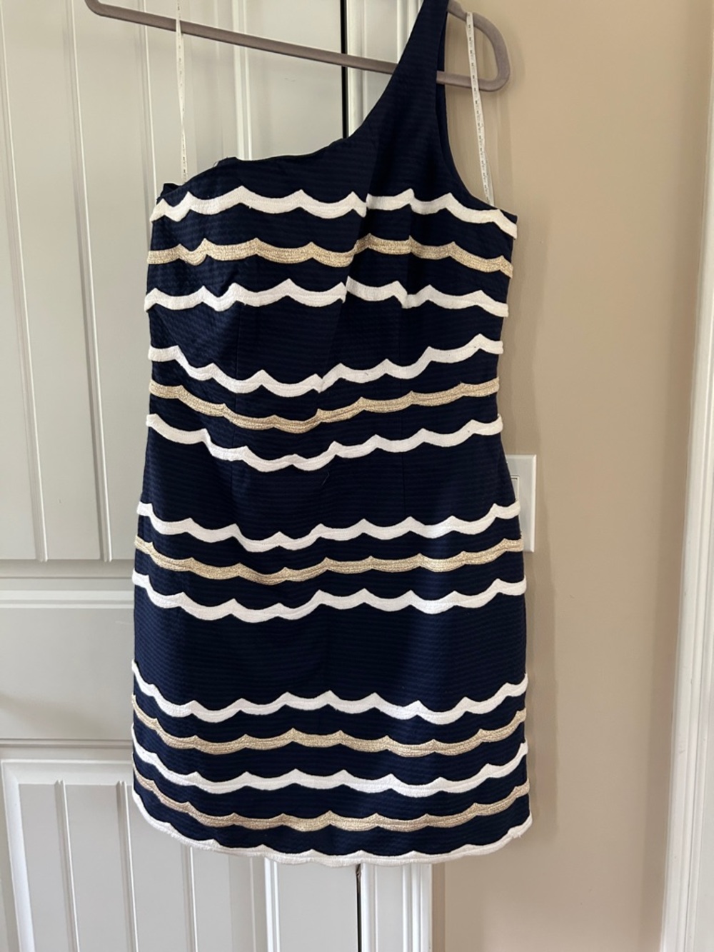 Lily Pulitzer one shoulder navy dress.